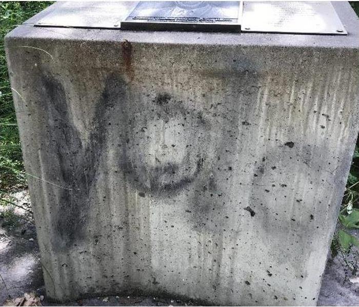 graffitied concrete stand 